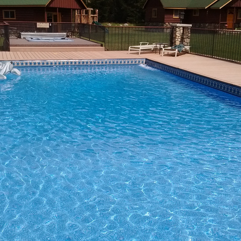 A completed backyard swimming pool